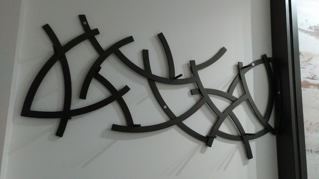 Scultura e decorazione artistica da parete in ferro battuto Amsa